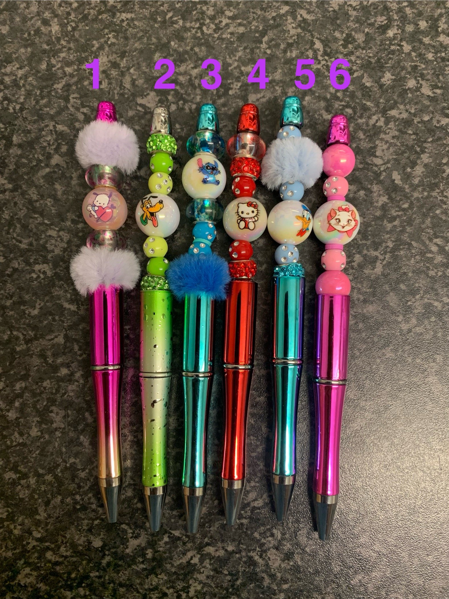 Hand crafted pen with characters