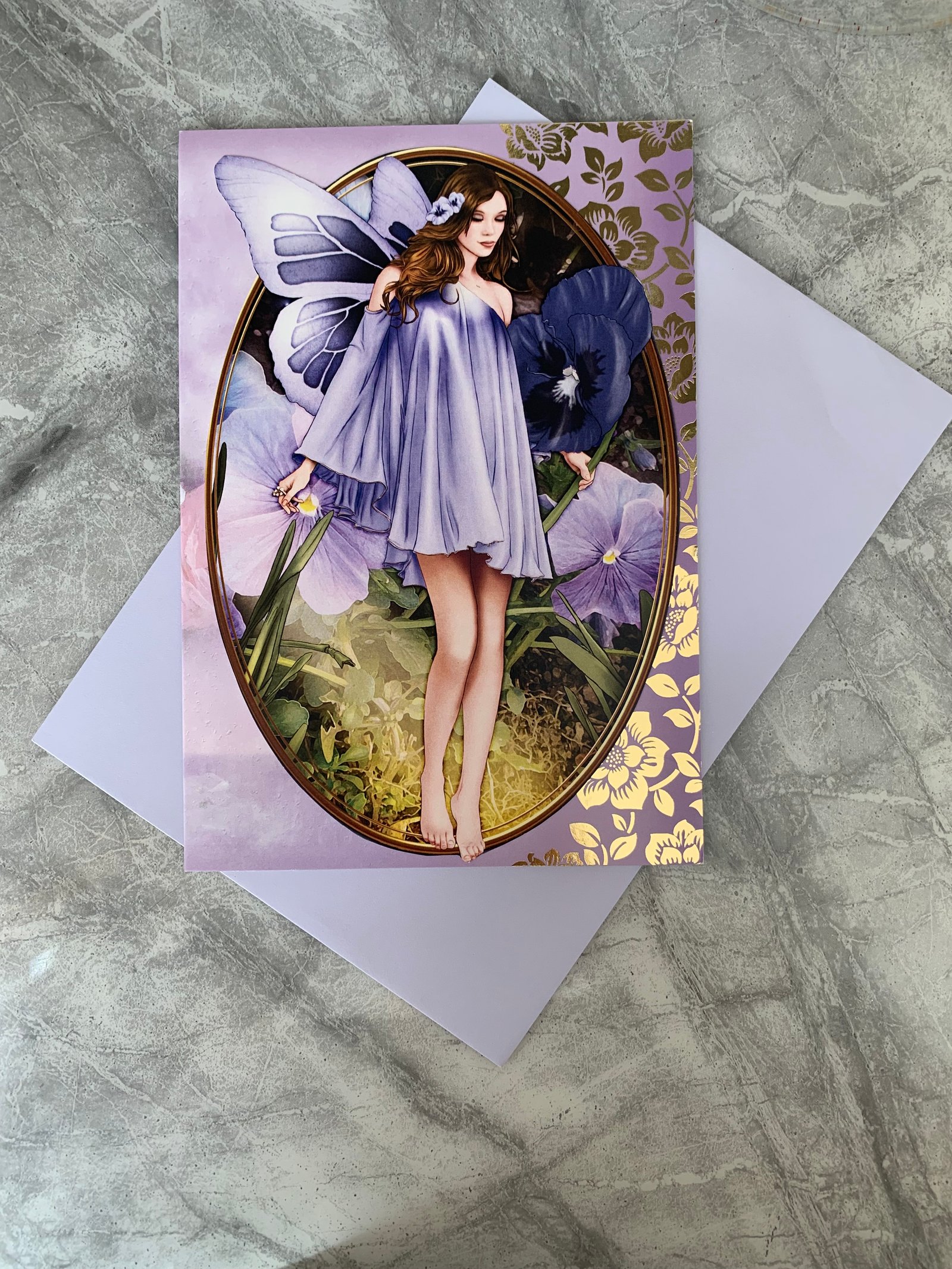 Hand crafted happy birthday card with purple fairy